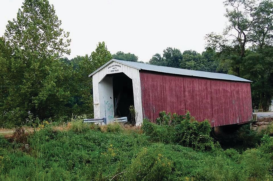 The Wallace Covered Bridge was built in 1871 and spans Sugar Mill Creek.
